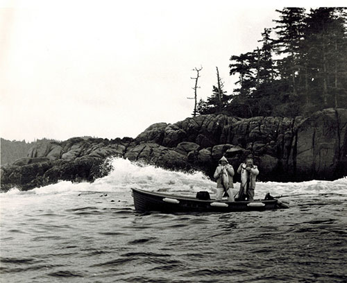 Two men fishing on the coast